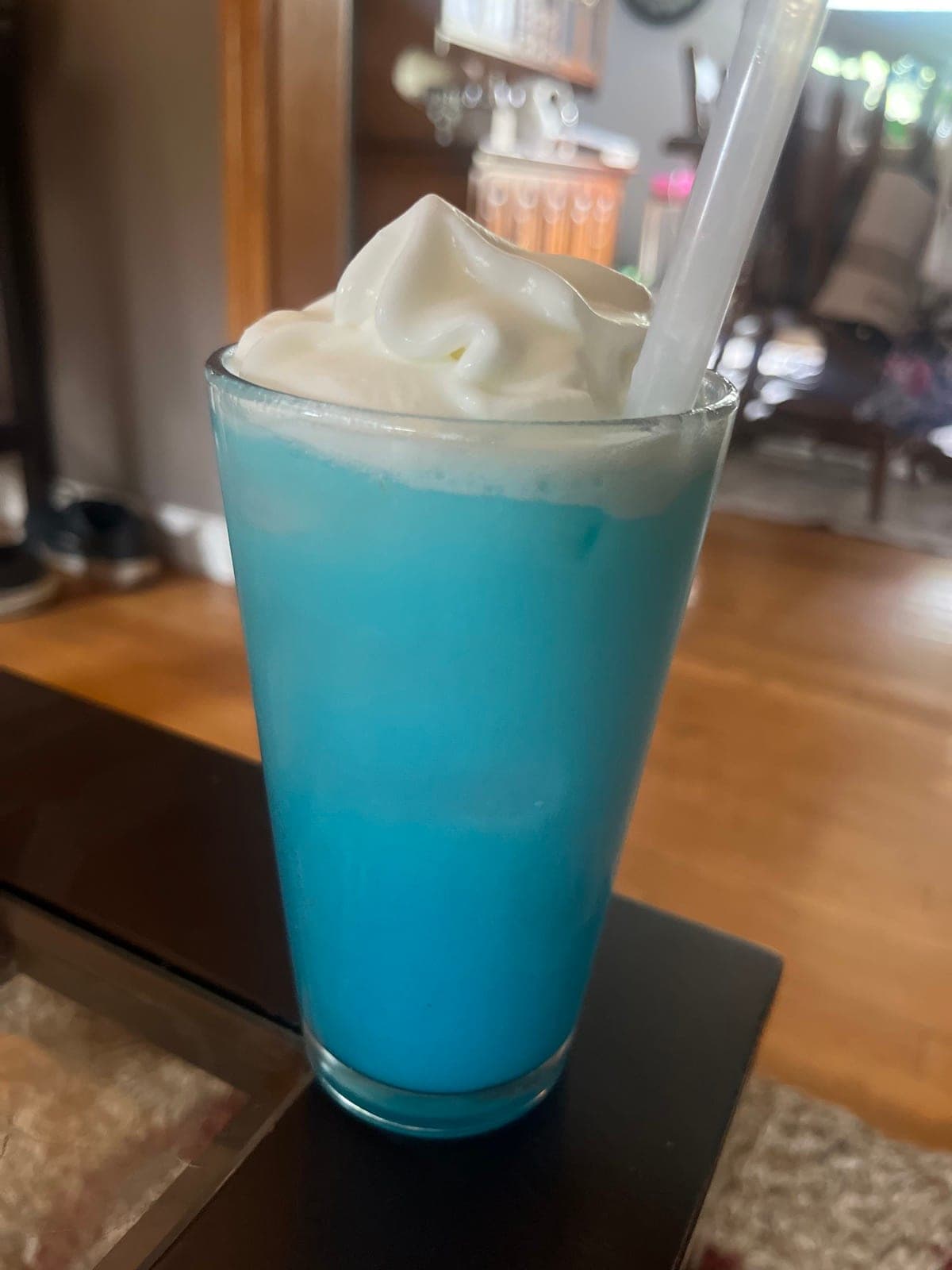 Blue Code Blue Razz dirty soda topped with cream